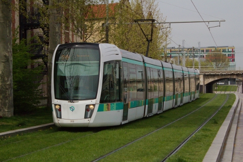 RATP Citadis 402 tram no. 313 heading alongside the Canal de Saint-Denis in Paris on 21st April 2016.