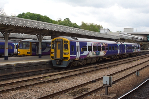 Northern class 158 waiting in Sheffield for the departure as 2L38 to Leeds. On platform 3A Northern "Pacer" class 144 no. 144001 awaiting the departure as 2R79 to Scunthorpe. Sheffield, 19th May 2016