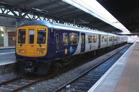 Northern class 319 no. 319448 just after arriving at Manchester Airport on 13th March 2018 with a service from Liverpool Lime Street.