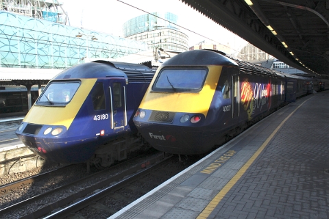 First Great Western HST class 43 powercars no. 43180 and classmate 43027 "90 glorious years" awaiting the next departures at London Paddington on 15th March 2018. 