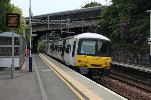 Scotrail class 365/5 no. 365517 hurried through Falkirk High as an empty stock move towards Edinburgh on 26th June 2018. 